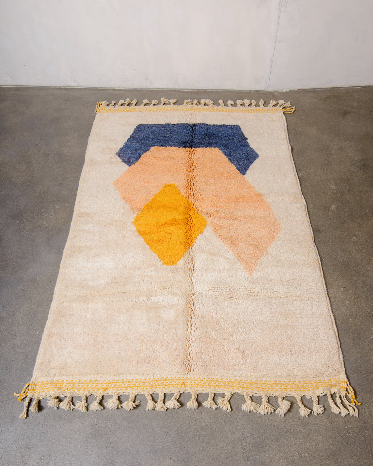 Modern, designer, handcrafted Berber rug from Morocco. Beniourain carpet with beautiful colours and patterns and fluffy wool texture.